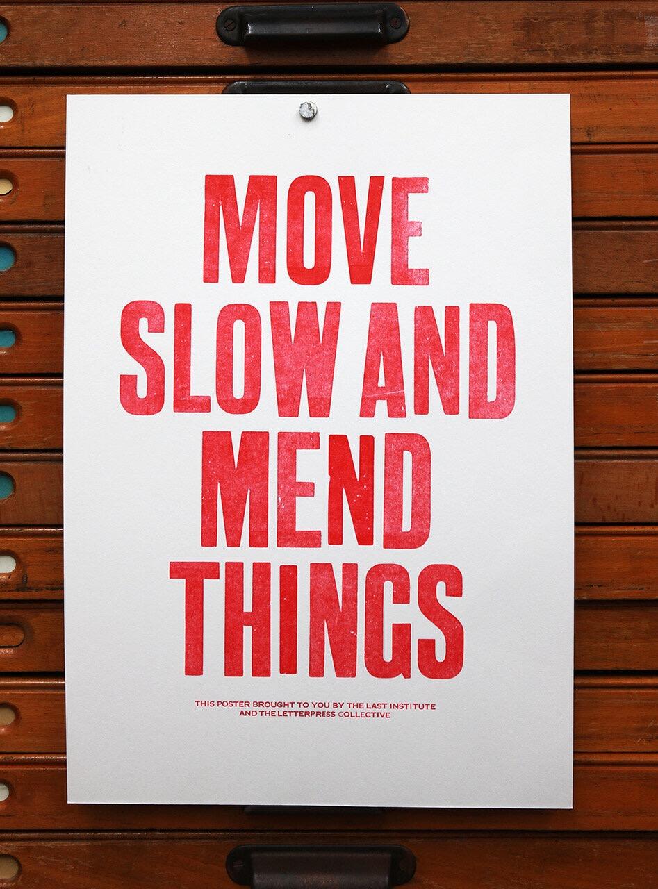 A poster with large red type:
Move Slow And Mend Things